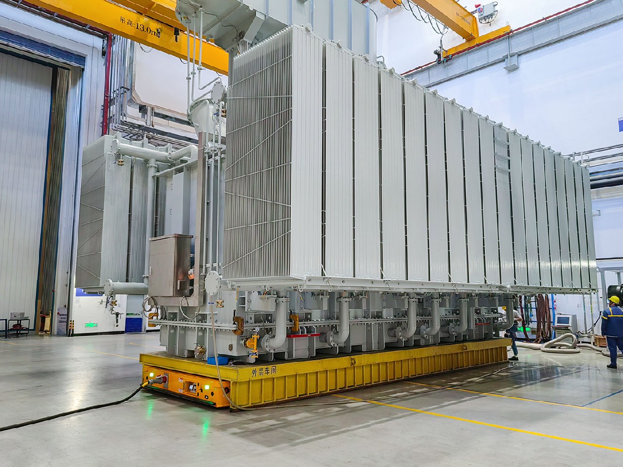 Semco 400-tonne class Heavy Duty AGV moving heavy industrial equipment on the factory floor